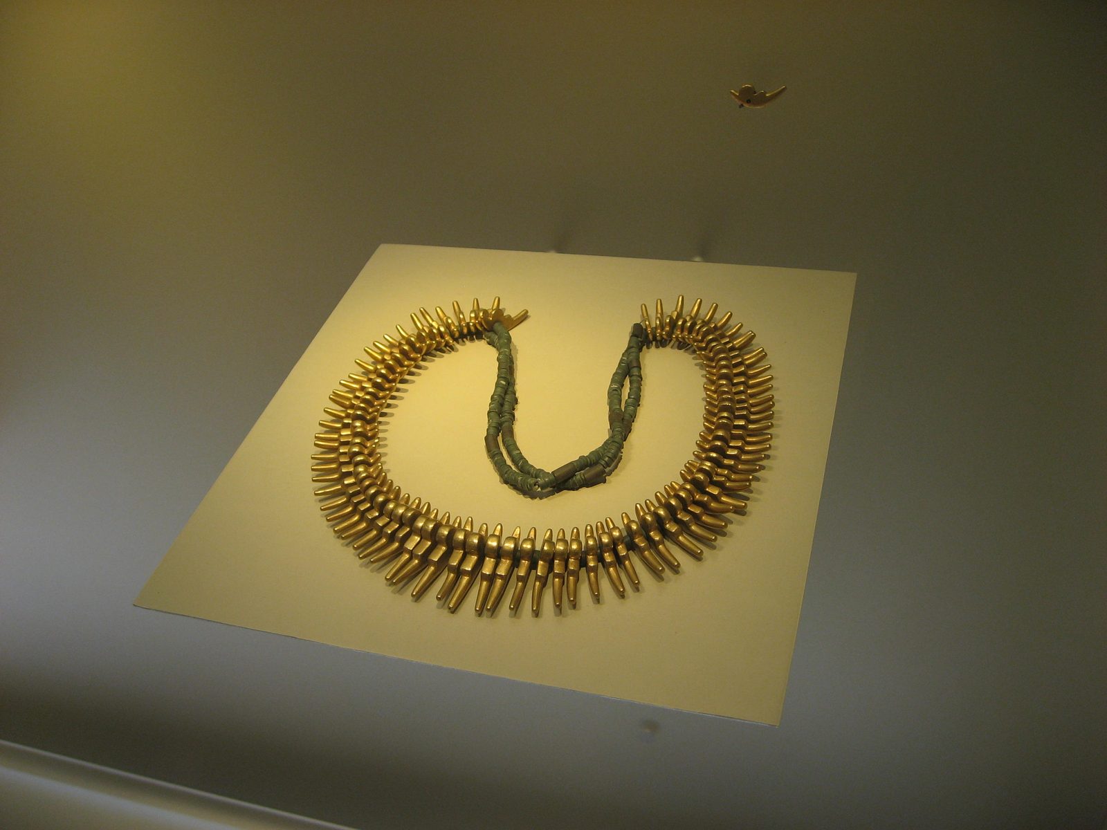 Hand-made gold necklace.  This was made without molds, which I thought was impressive given the...