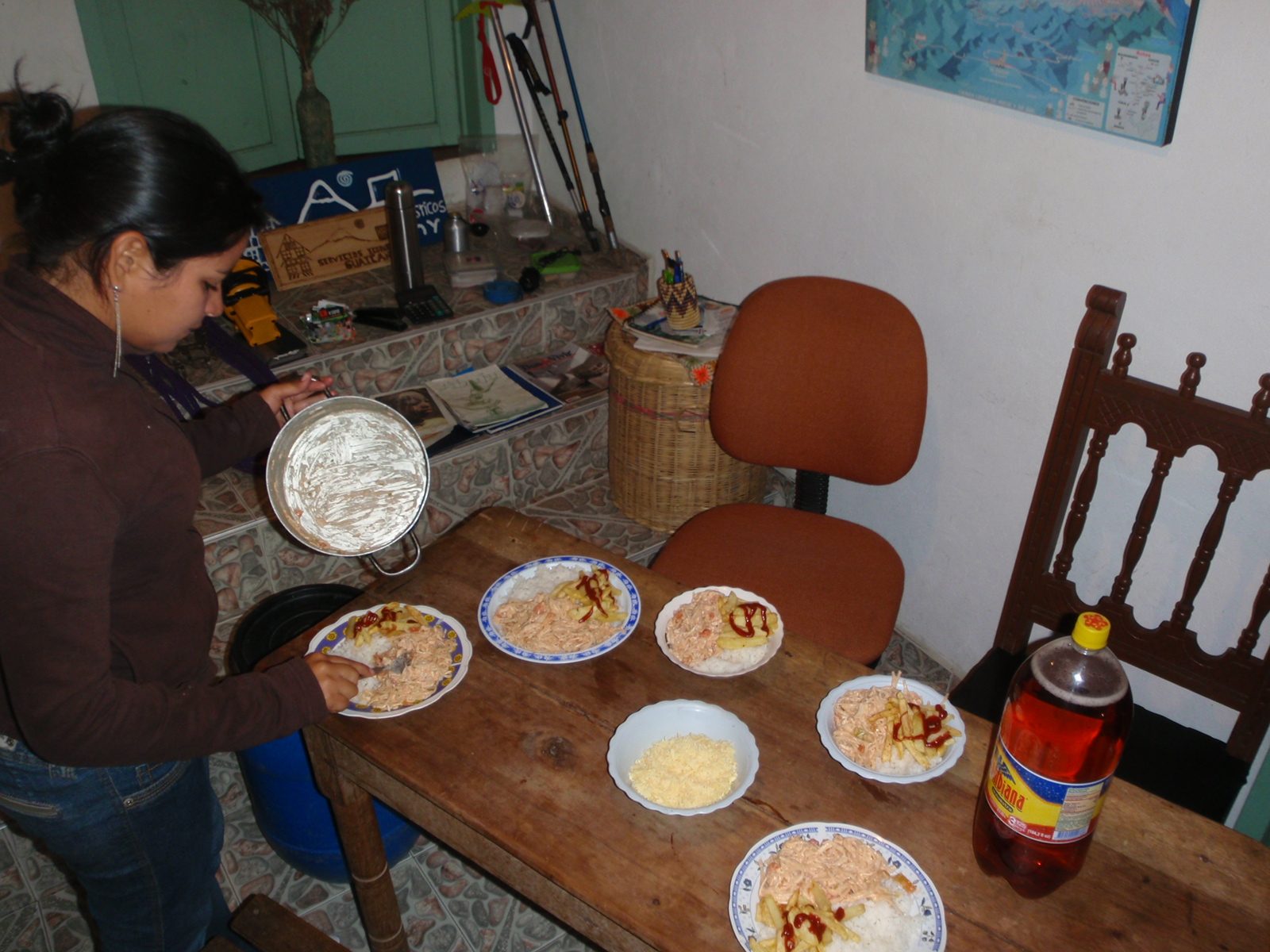 For dinner, a group of the local guides came over to the house I was staying in and cooked. ...