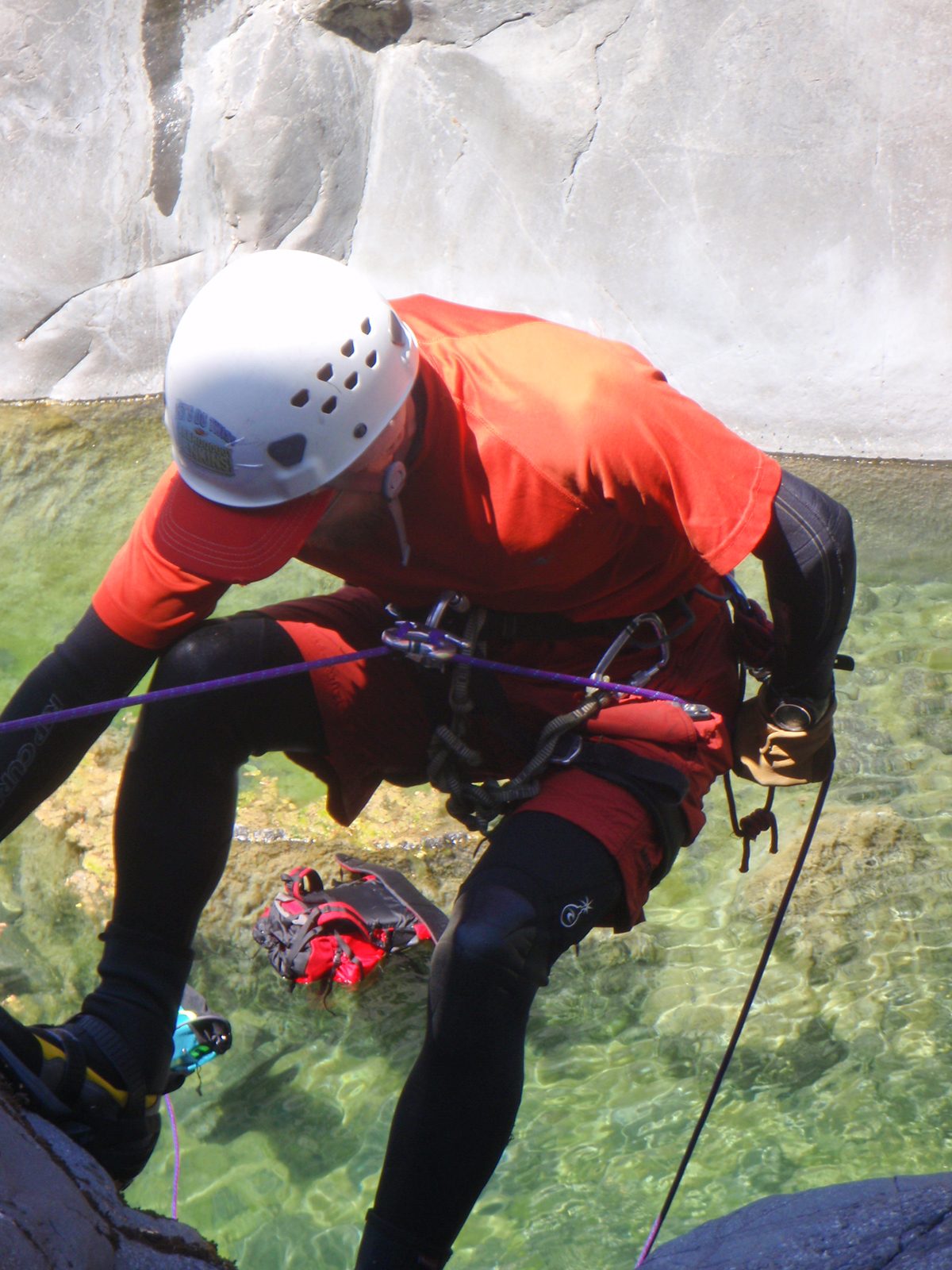 John on the first rappel uses his right hand for balance.  Why are these things always so awkward?