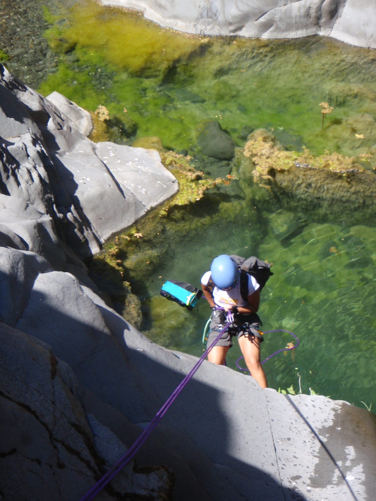 Christina finishes the first rappel.