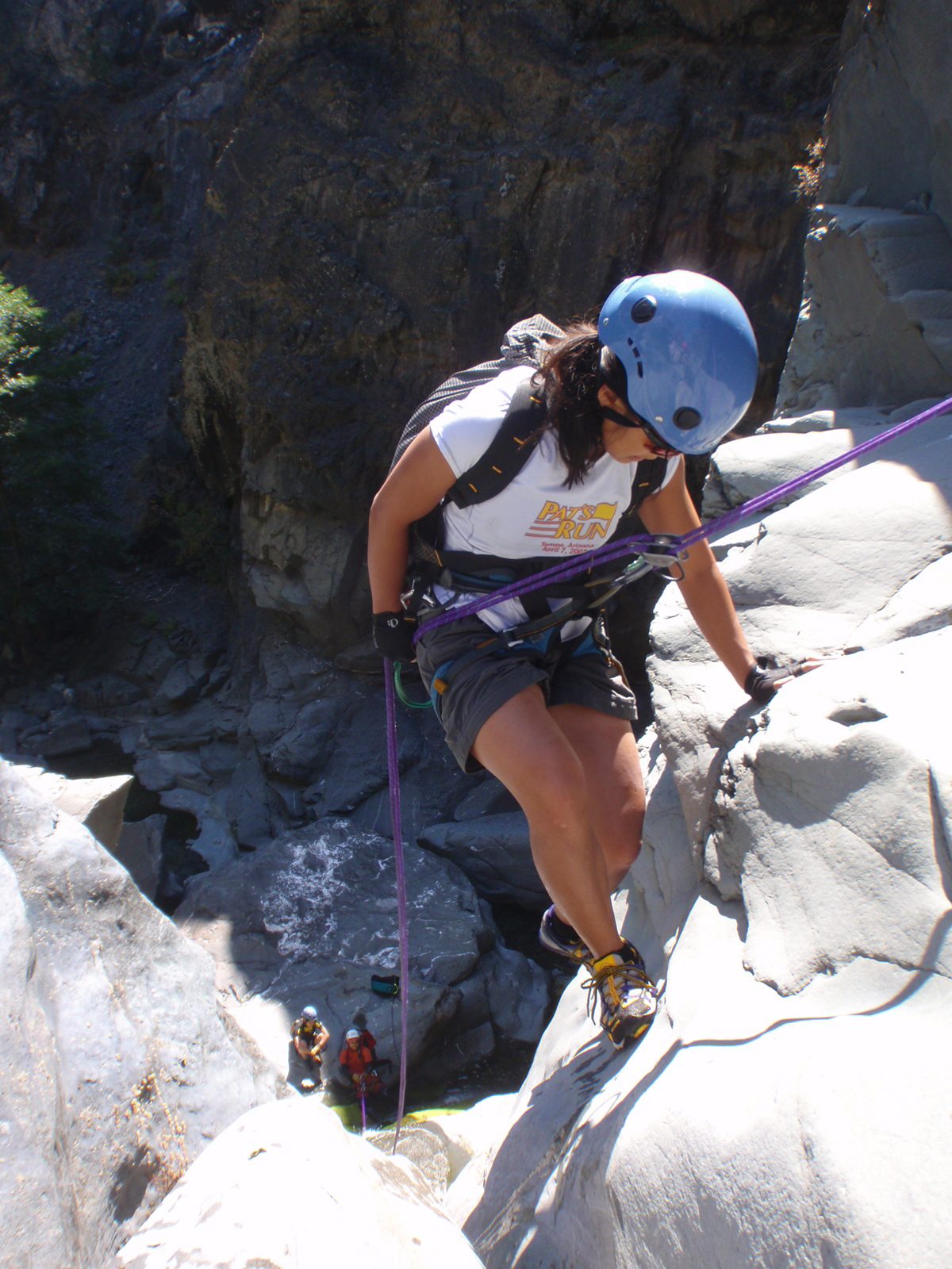 Christina, balancing herself on the second rappel.