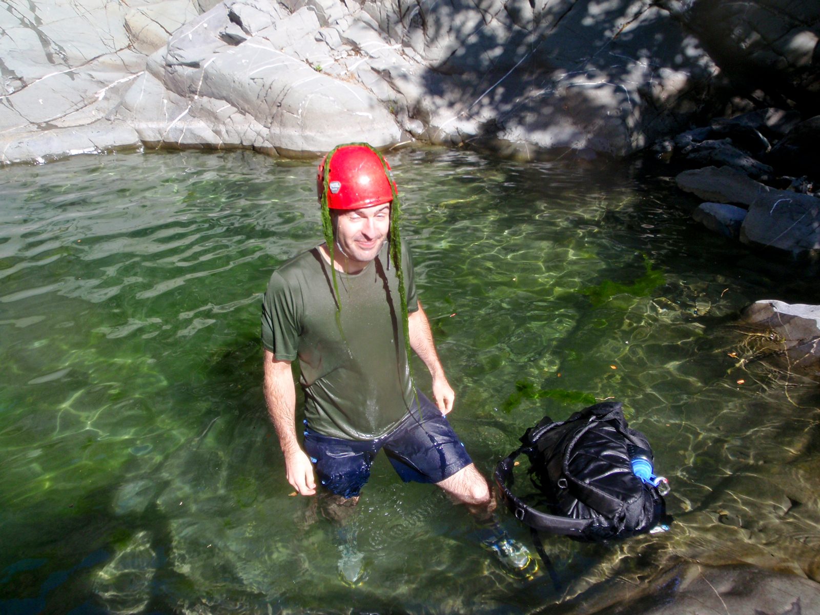 Swamp thing (Chris) emerges from the gloomy depths of an algae filled pool.