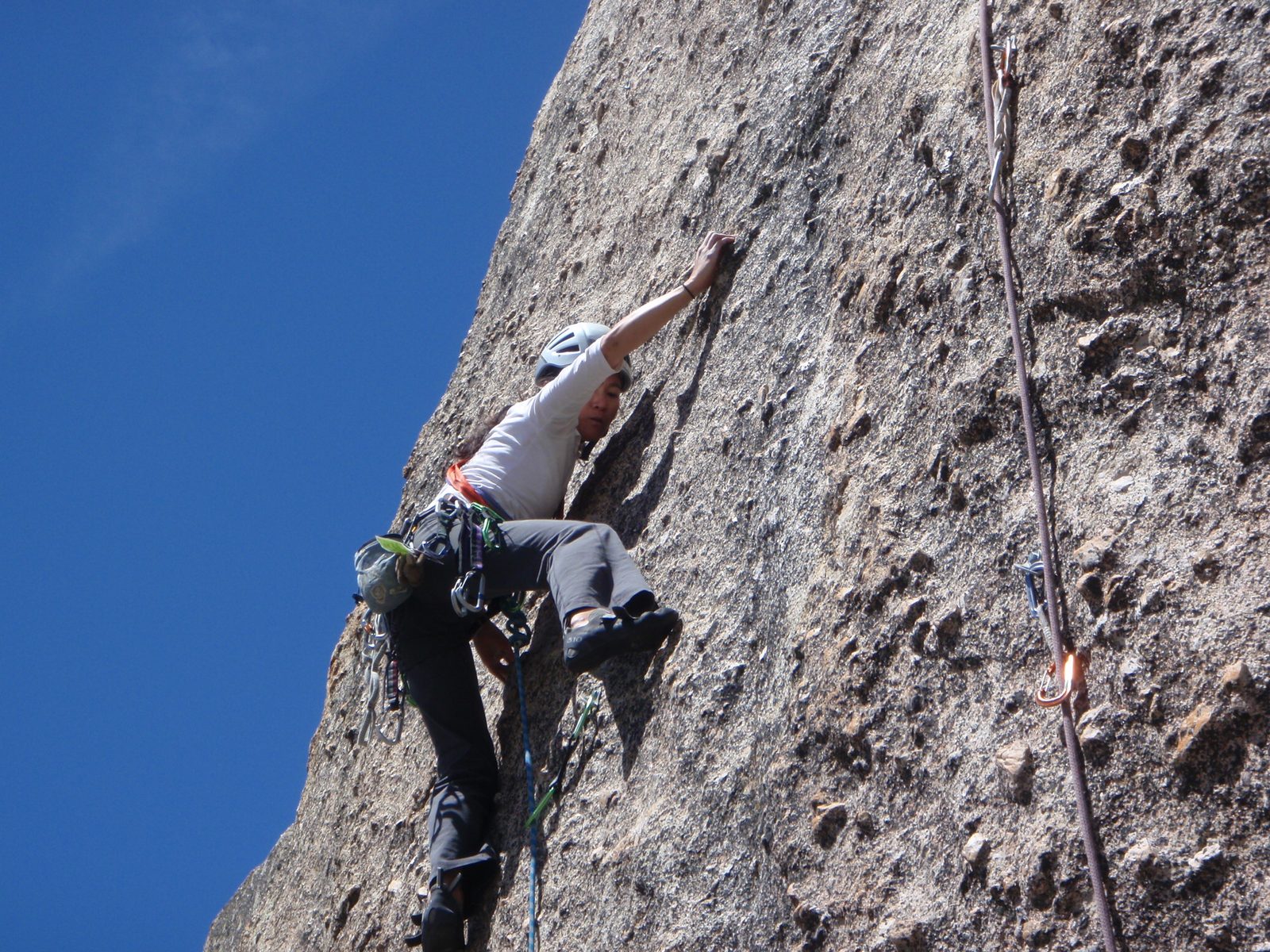 Dong lead climbing a 5.8 route at Chipmunk Flat along CA-108 near Sonora Pass.