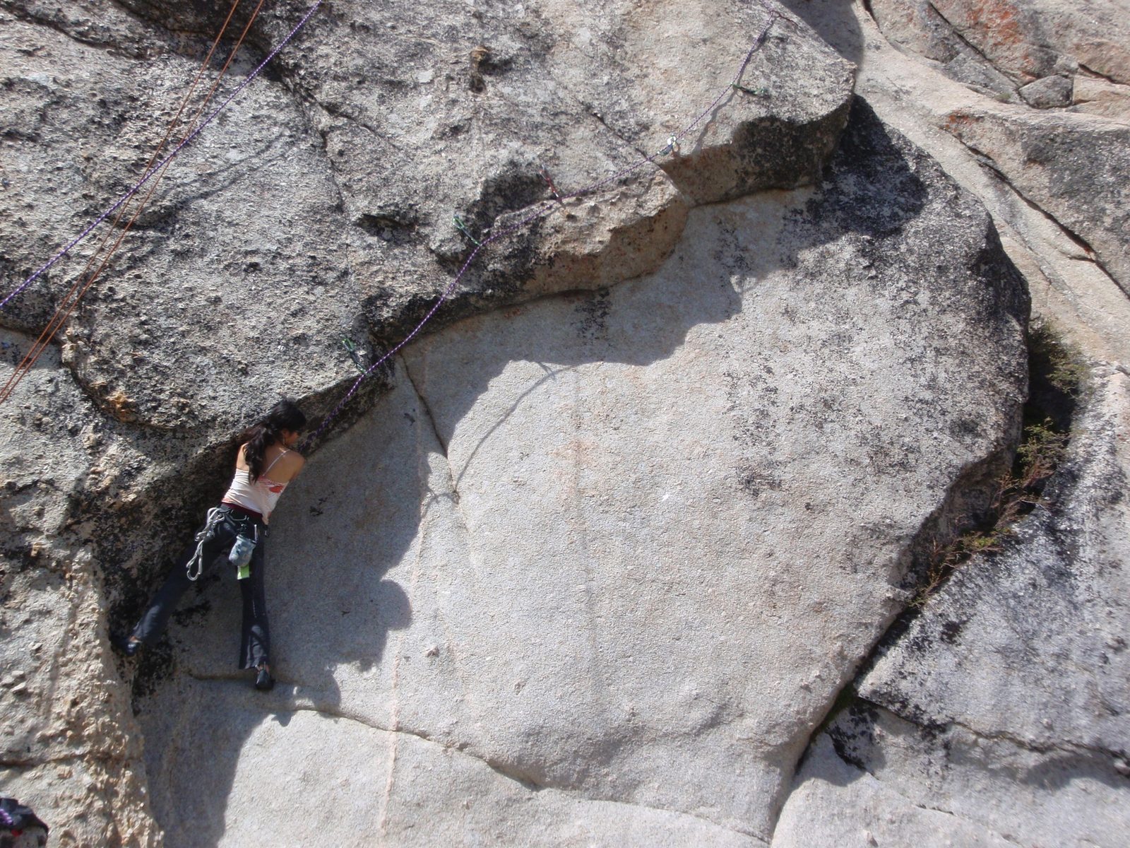 Dong climbing the 5.10c after I led it. Since it's a traverse, it's really just as hard for the...