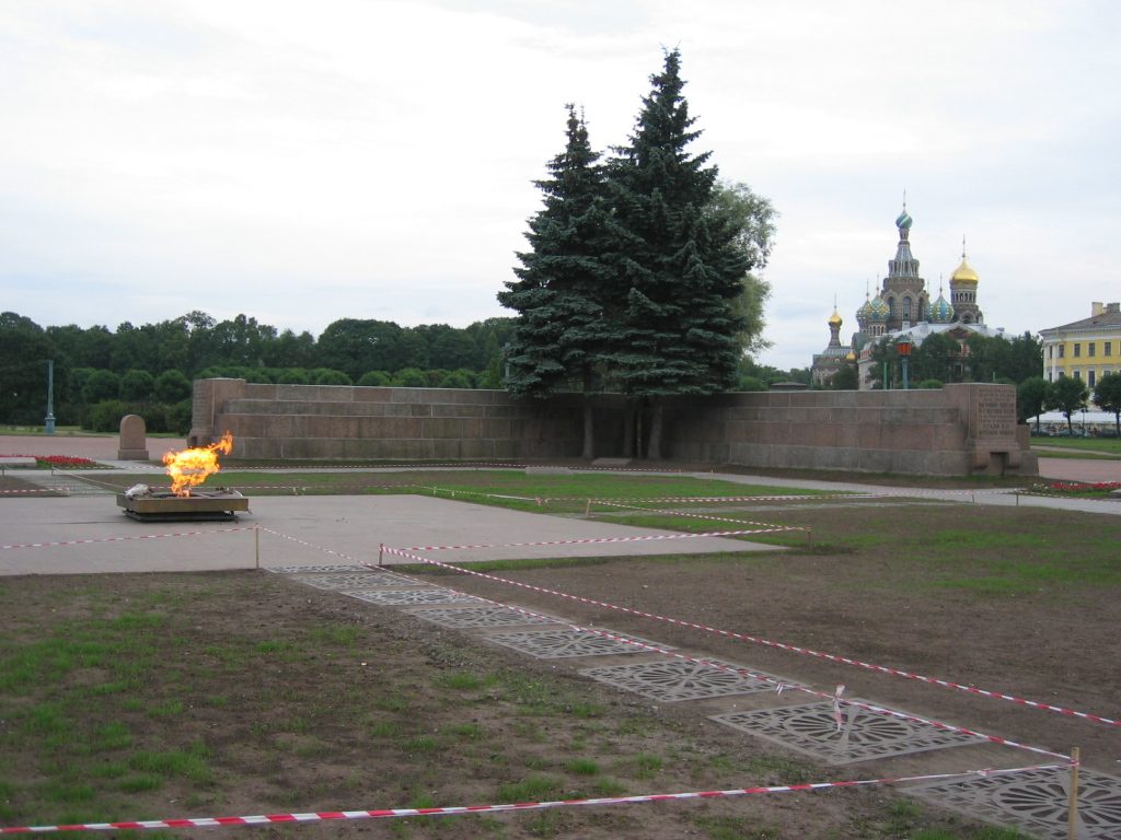 The eternal flame for the unknown soldier, with the Church on the Site of Spilled Blood in the...