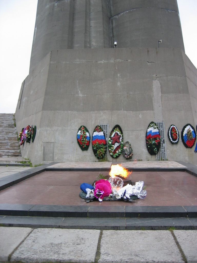 Eternal flame in Murmansk.  Note the size and number of flowers left here.