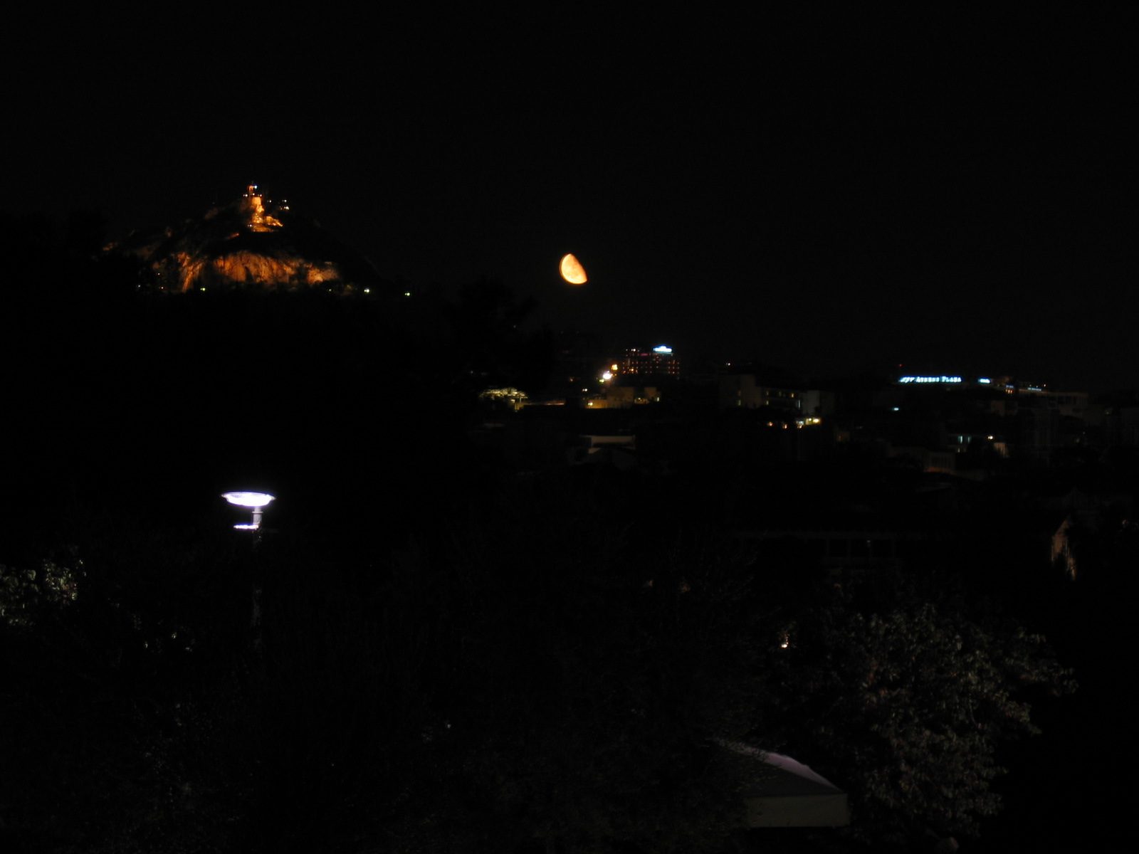 I call this one "Moonrise over the Acropolis".  Note to self:  really must get camera good at...