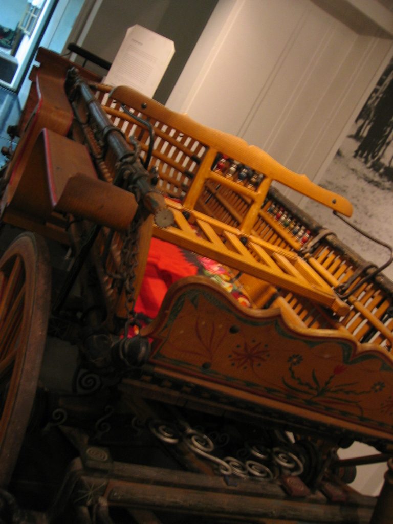 Yugoslavian textiles were really beautiful.  This wagon or carriage was lined with woven wool blankets.