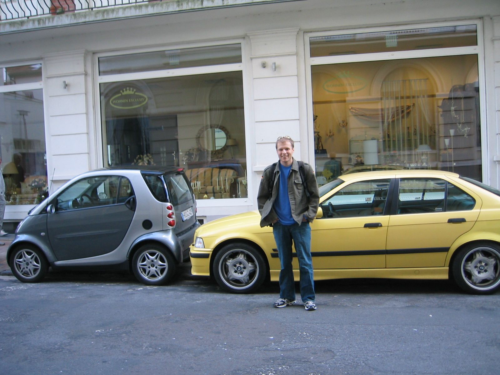 John and an M3 with fake M3 wheels.