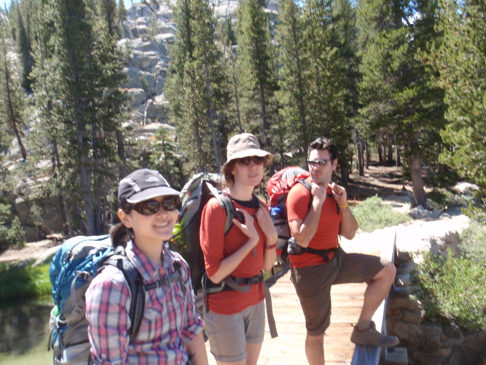 Crossing the Tuolumne River on a footbridge.