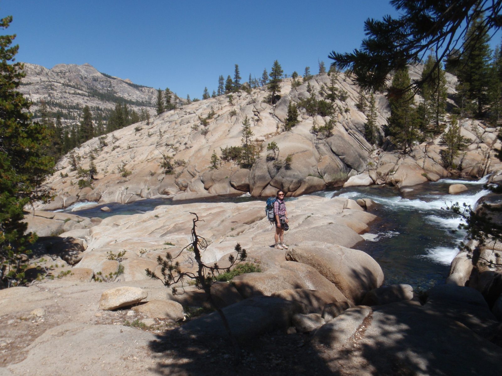 Monica, observing a cascading section of the Tuolumne River.