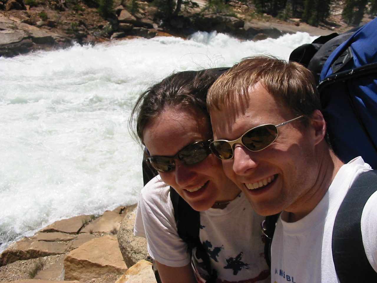 Self photography in front of the rushing Tuolumne River.