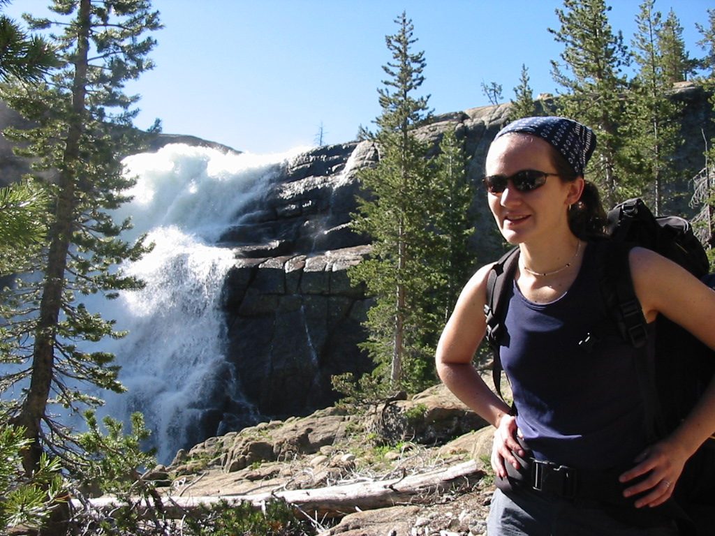 Rachel next to one of the upper Tuolumne Falls.