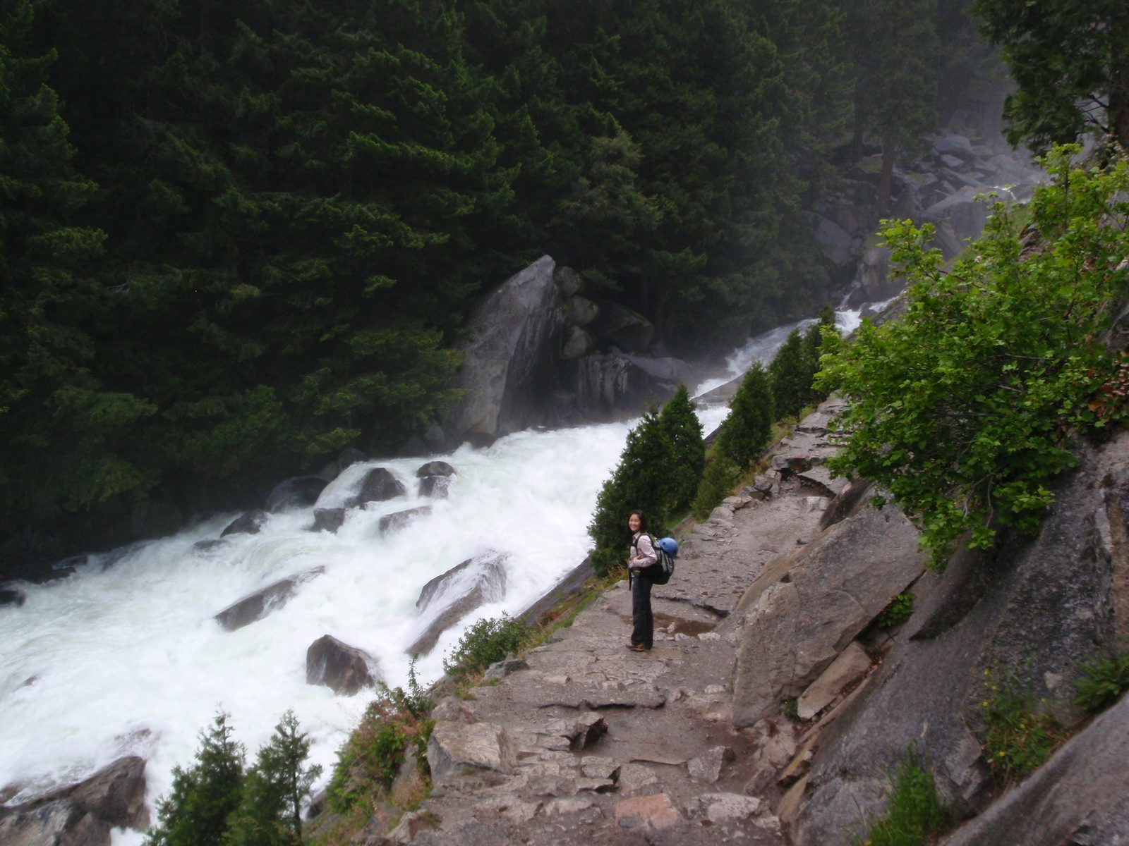 Monica stands by the mighty Merced River as it races by. El Nino meant lots of rain and snow and...