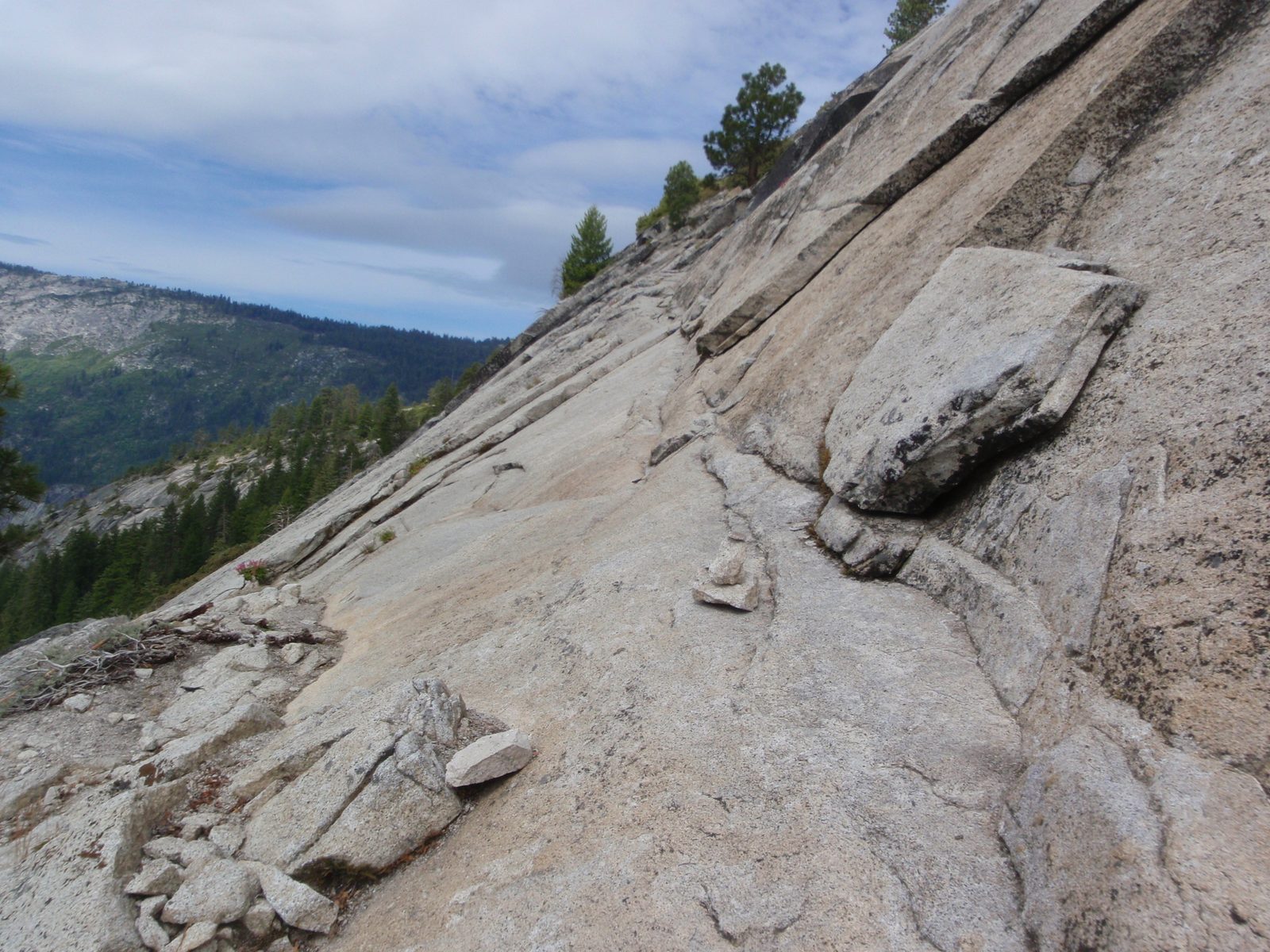 Improbable as it seems, this narrow ledge is our path, apparently.