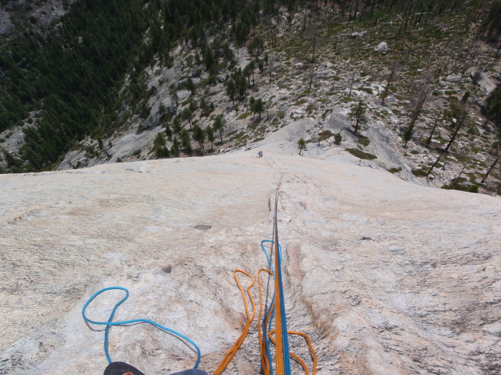 At the top of pitch 3: Monica is working her way up the first section of Snake Dike. The first...
