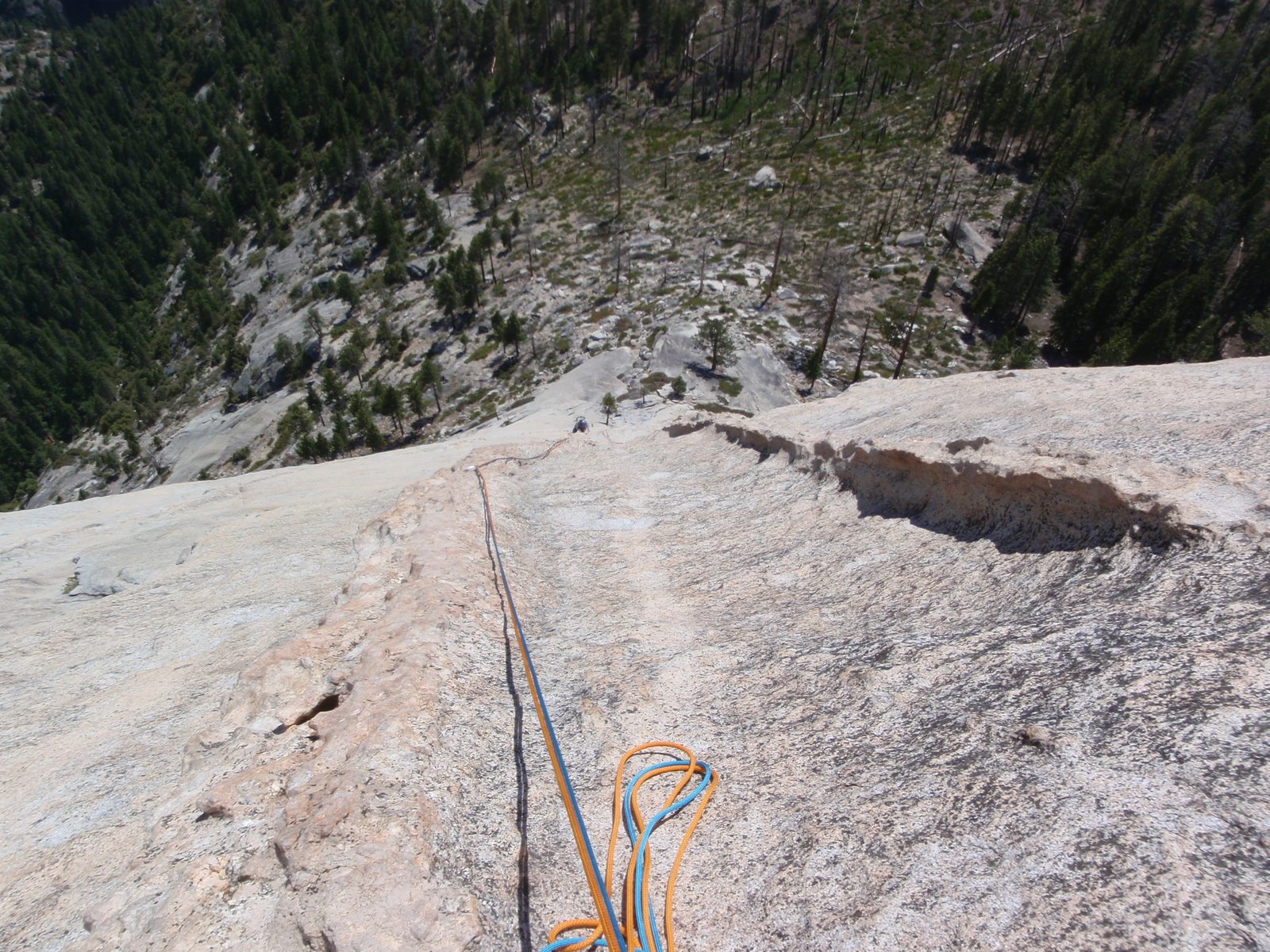 Monica making her way up to the top of pitch 4 or 5. "It's like climbing up the back of a...