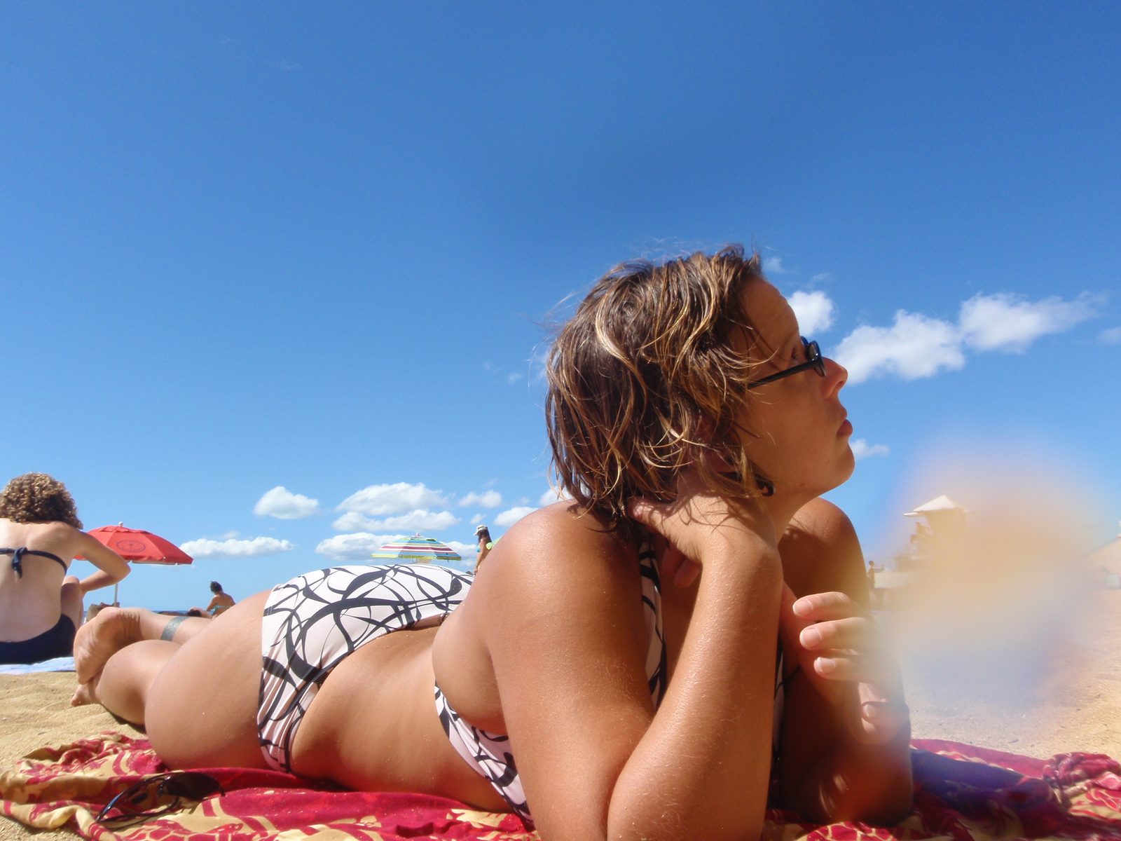 Lydia and I hanging out at the beach after swimming a bit.