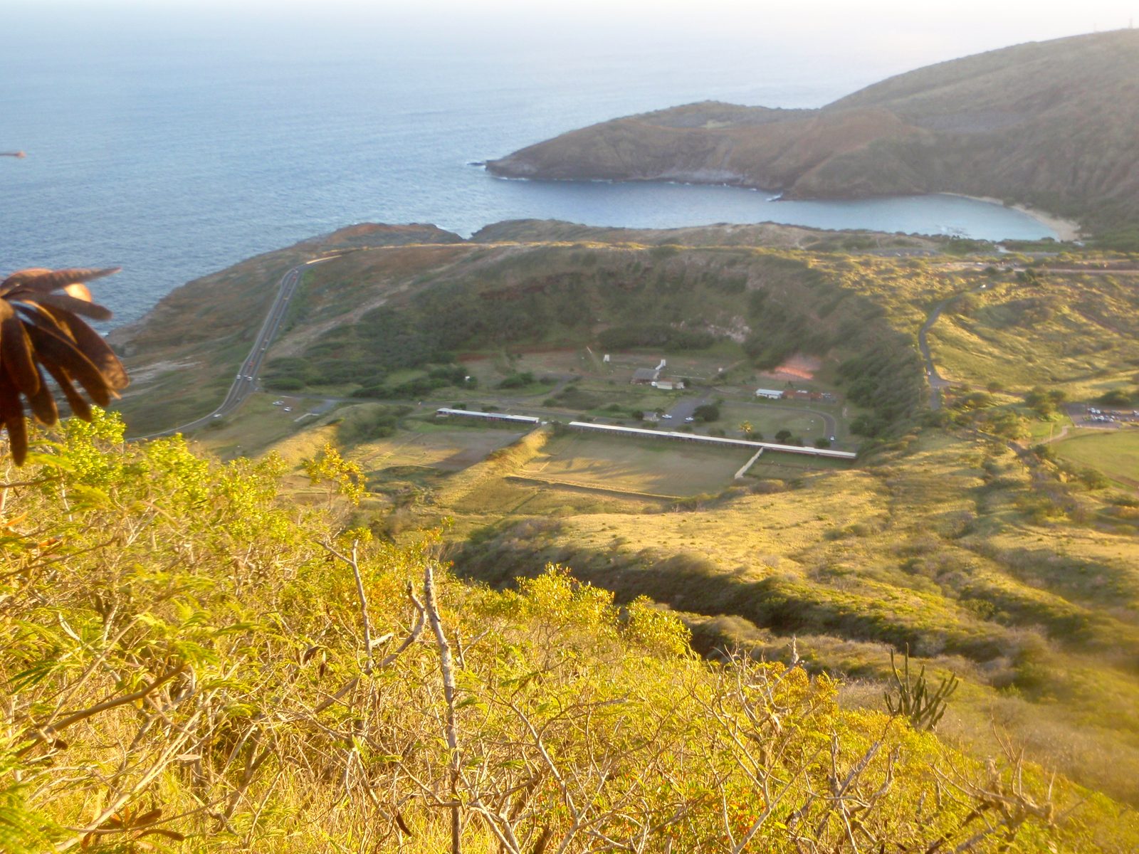 A view south toward another crater and in the distance Hanauma Bay, a state park and nature...