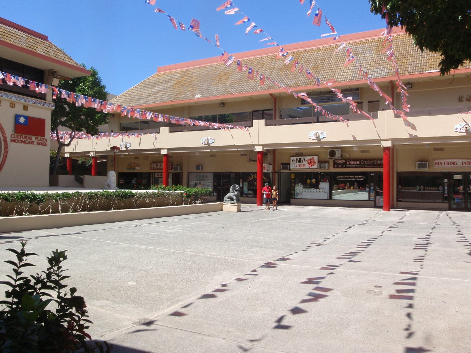 The Chinatown Cultural Plaza, flying the United States flag and the Taiwanese flag.  Strange as...