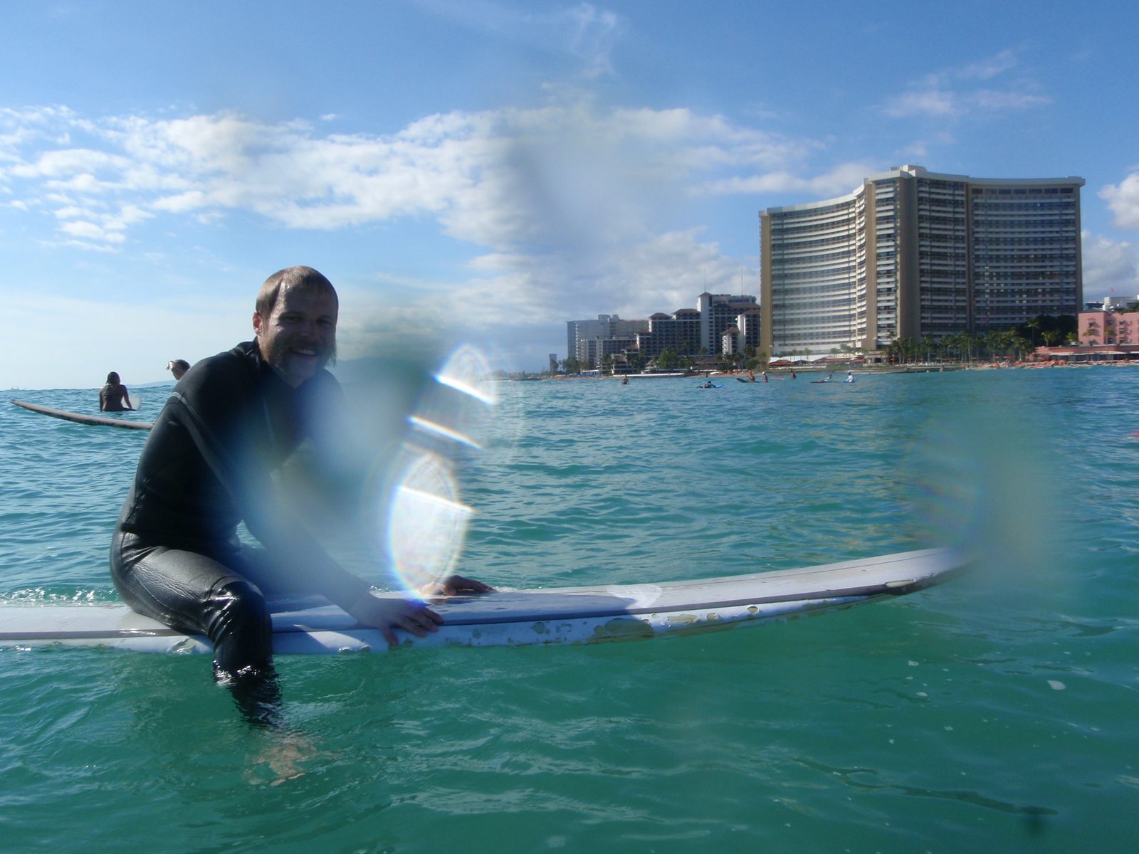 Me on my awesome $10 rental board.  It appears to have gotten a few nicks and dings along the way.