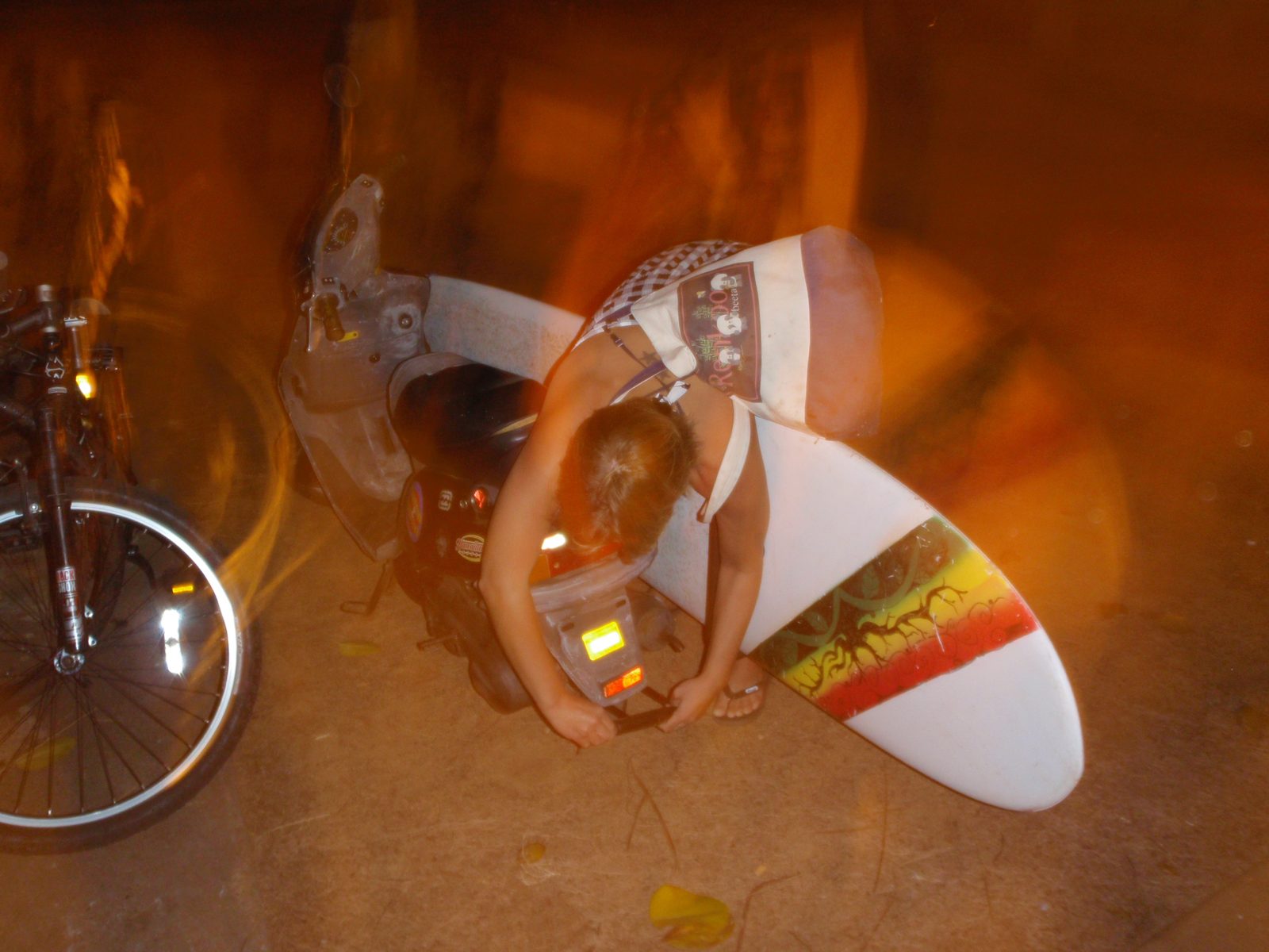 So, when we finally got back to Lydia's scooter, it was dark.  Lydia rode home with the...