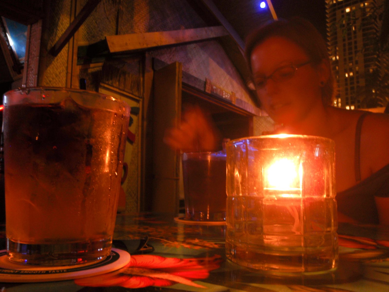 Arnold's Tiki Bar, Honolulu.  Two big screen TVs with surfing and decent $5 mai tais.  And free...