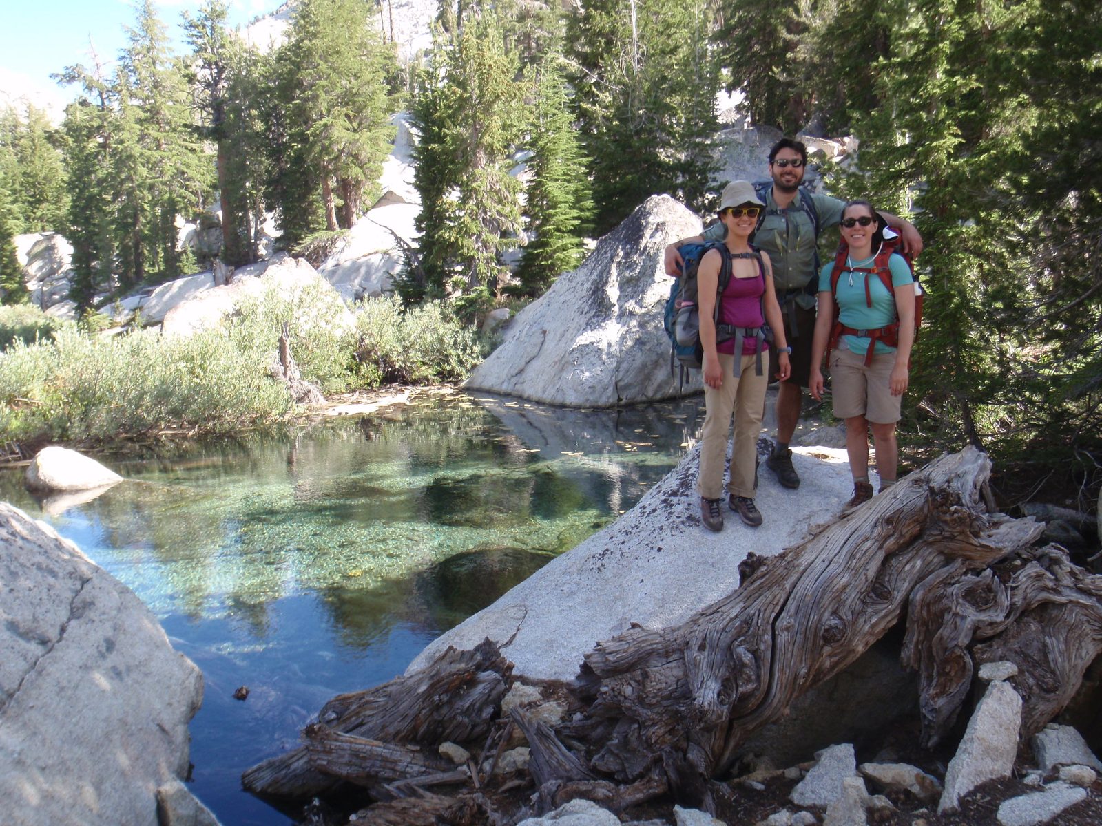 Group photo next to a small pond.