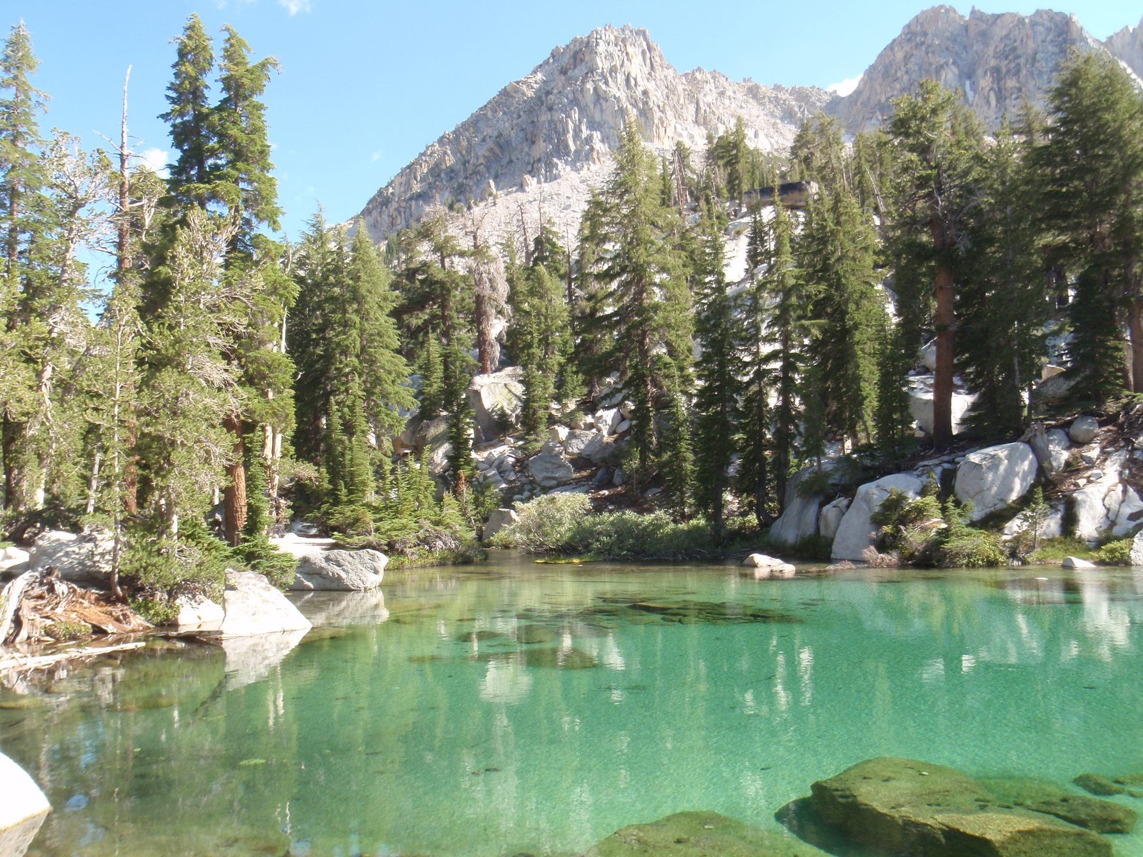 Green alpine lakes. It looked so inviting for swimming. Crystal clear and sandy-bottomed.