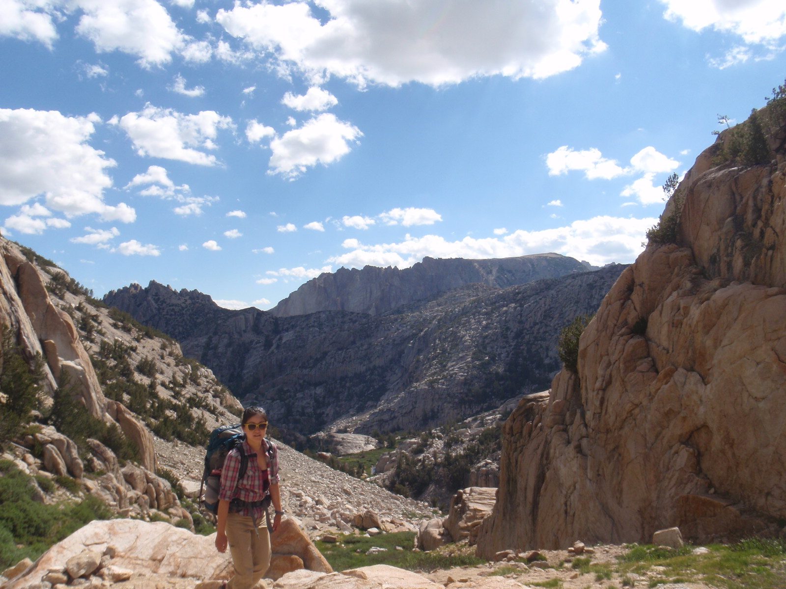 Monica nearing Snow Lake and the Sawtooths in the background.