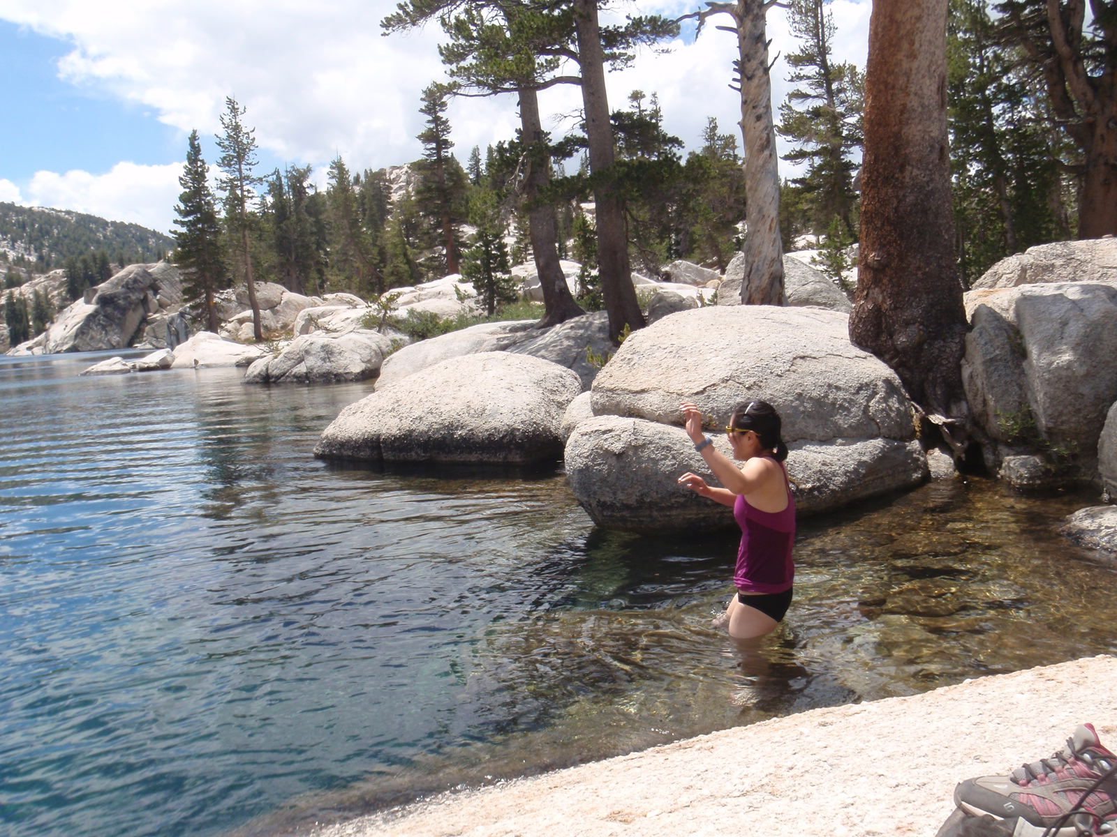 Monica, trying the hard way to get into cold water.