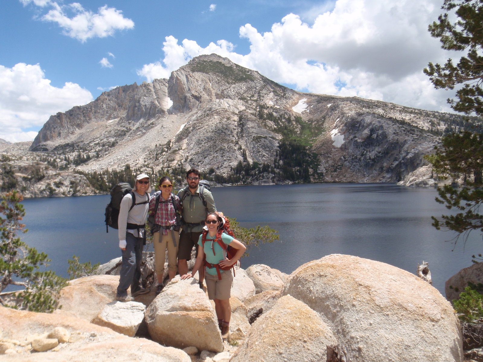 John, Monica, Jasper and Elaine with Peeler Lake / Crown Point behind.