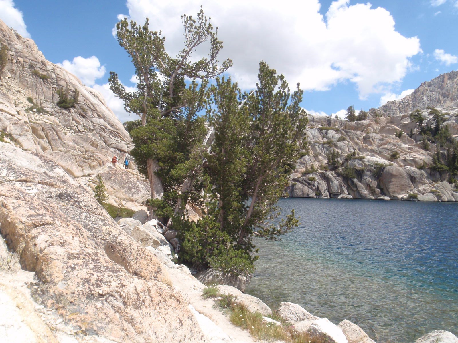 Path blasted into the steep rocky shoreline of Peeler Lake.