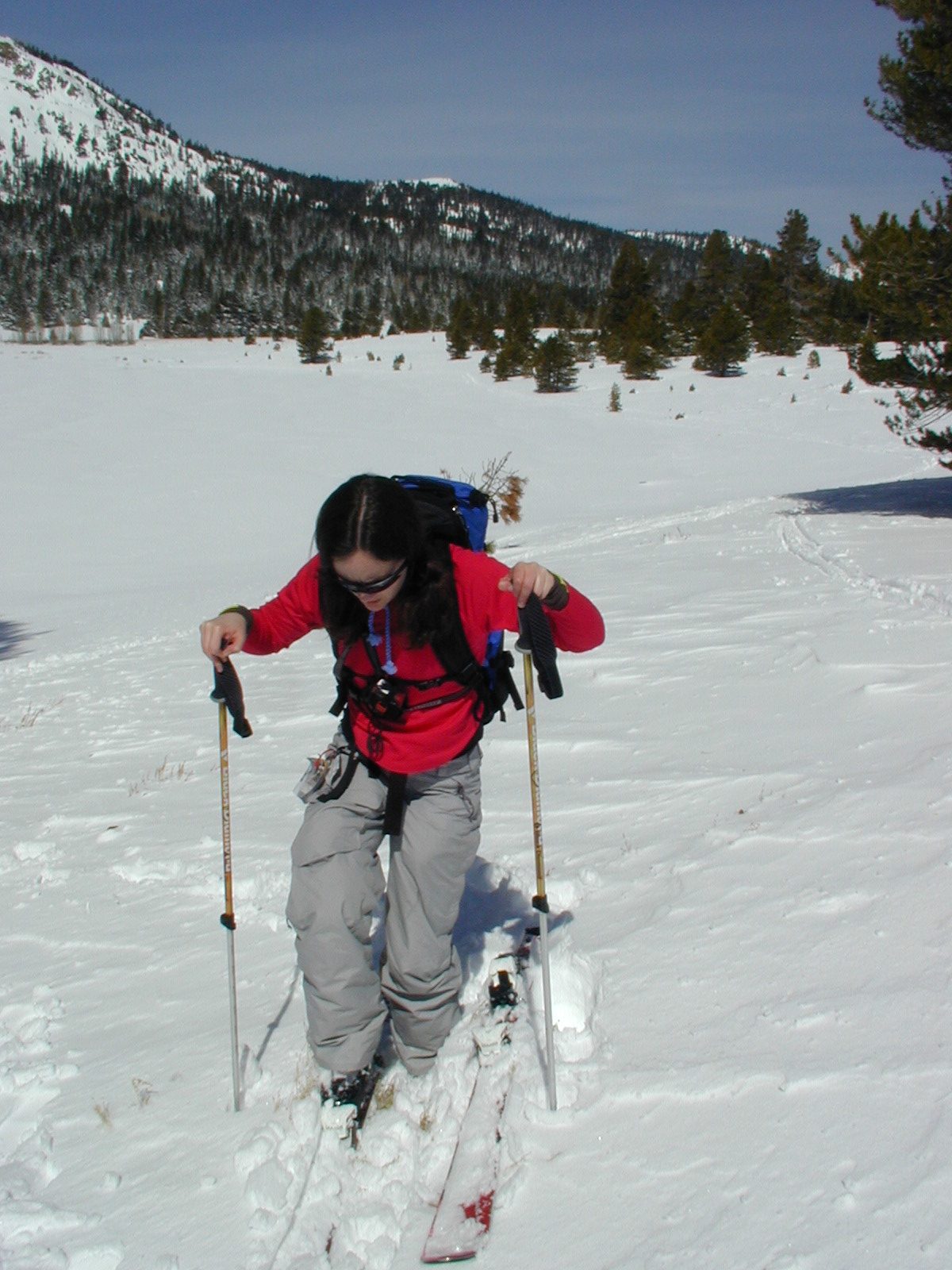 Rachel, stepping back into her binding at the beginning of our hike.