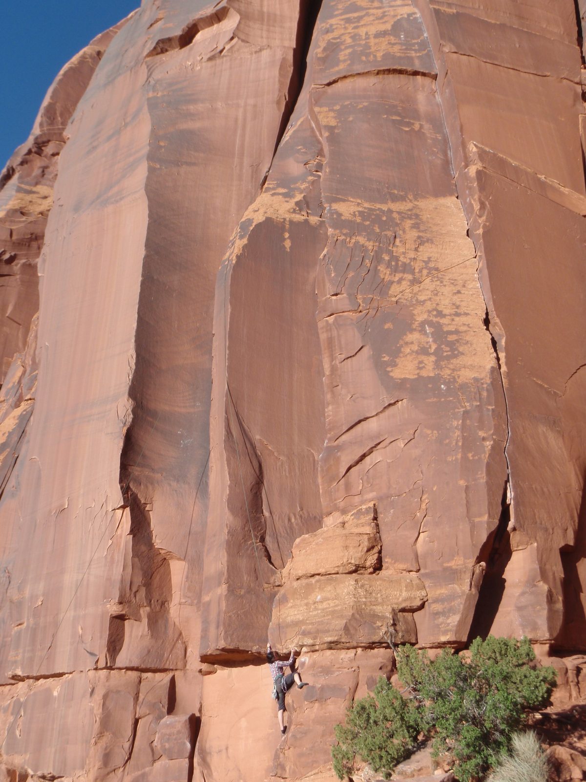 Monica climbing an unnamed 5.10 next to Tube Steaks Tomorrow.