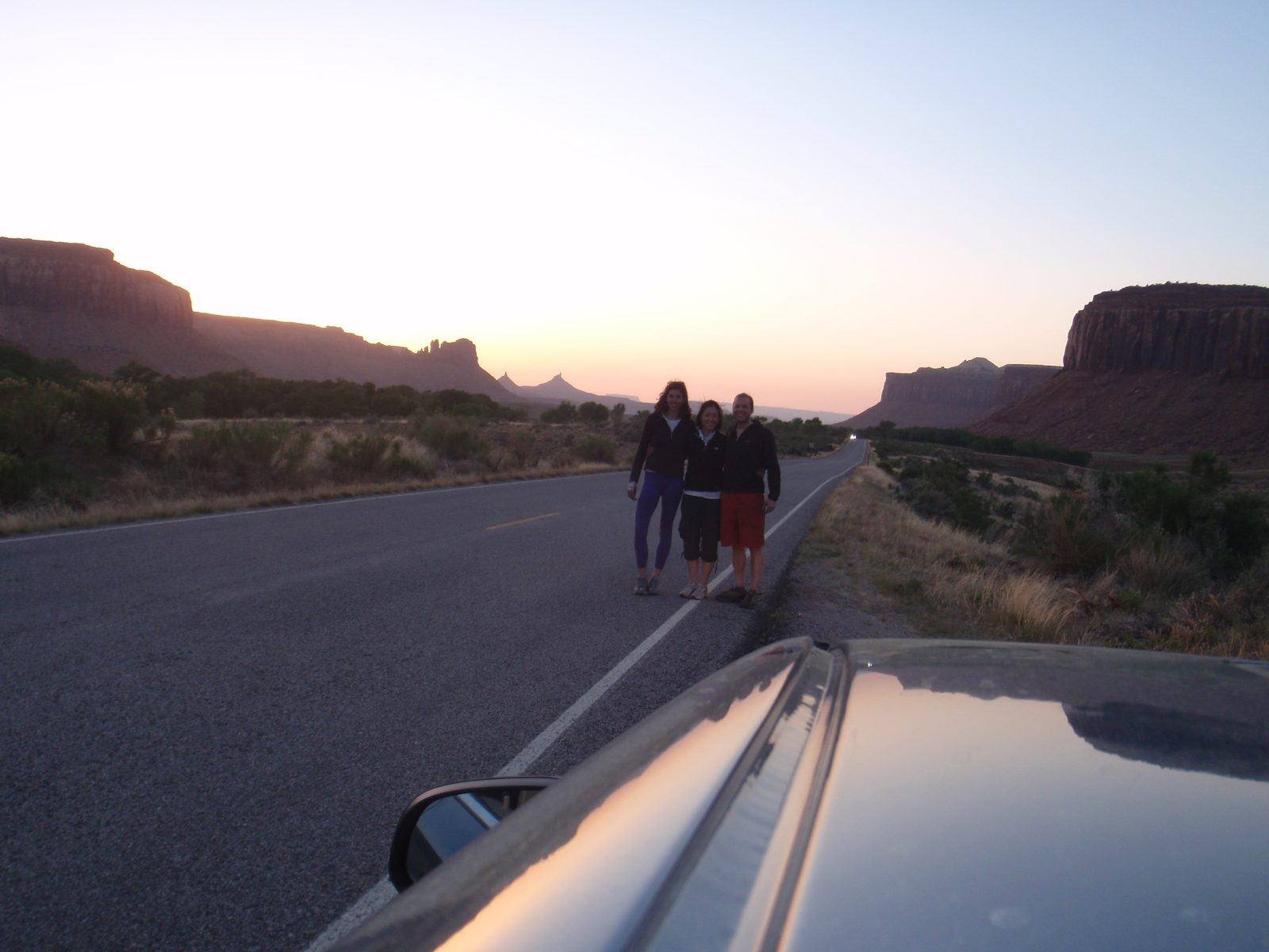 Group shot. North and South Six Shooter Peaks visible in the distance.