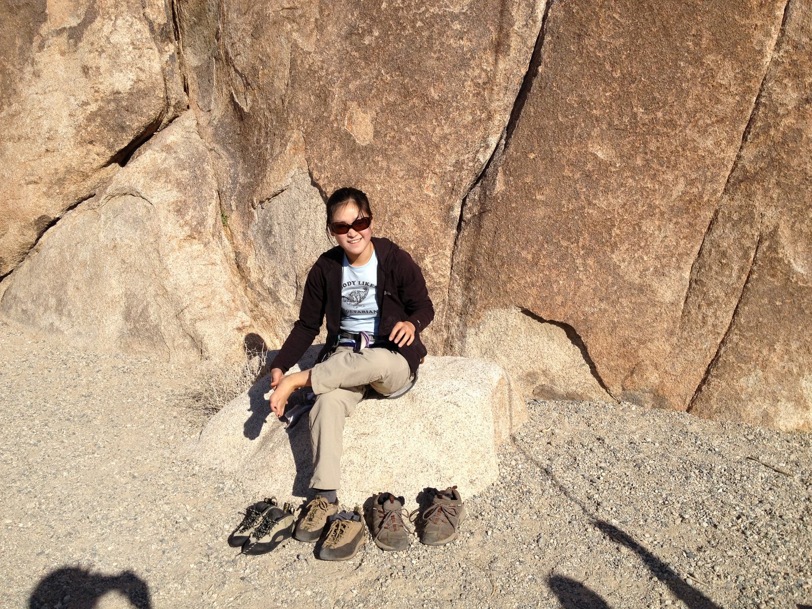 Monica, putting on her climbing kicks on Thanksgiving morning near Indian Cove in Joshua Tree...