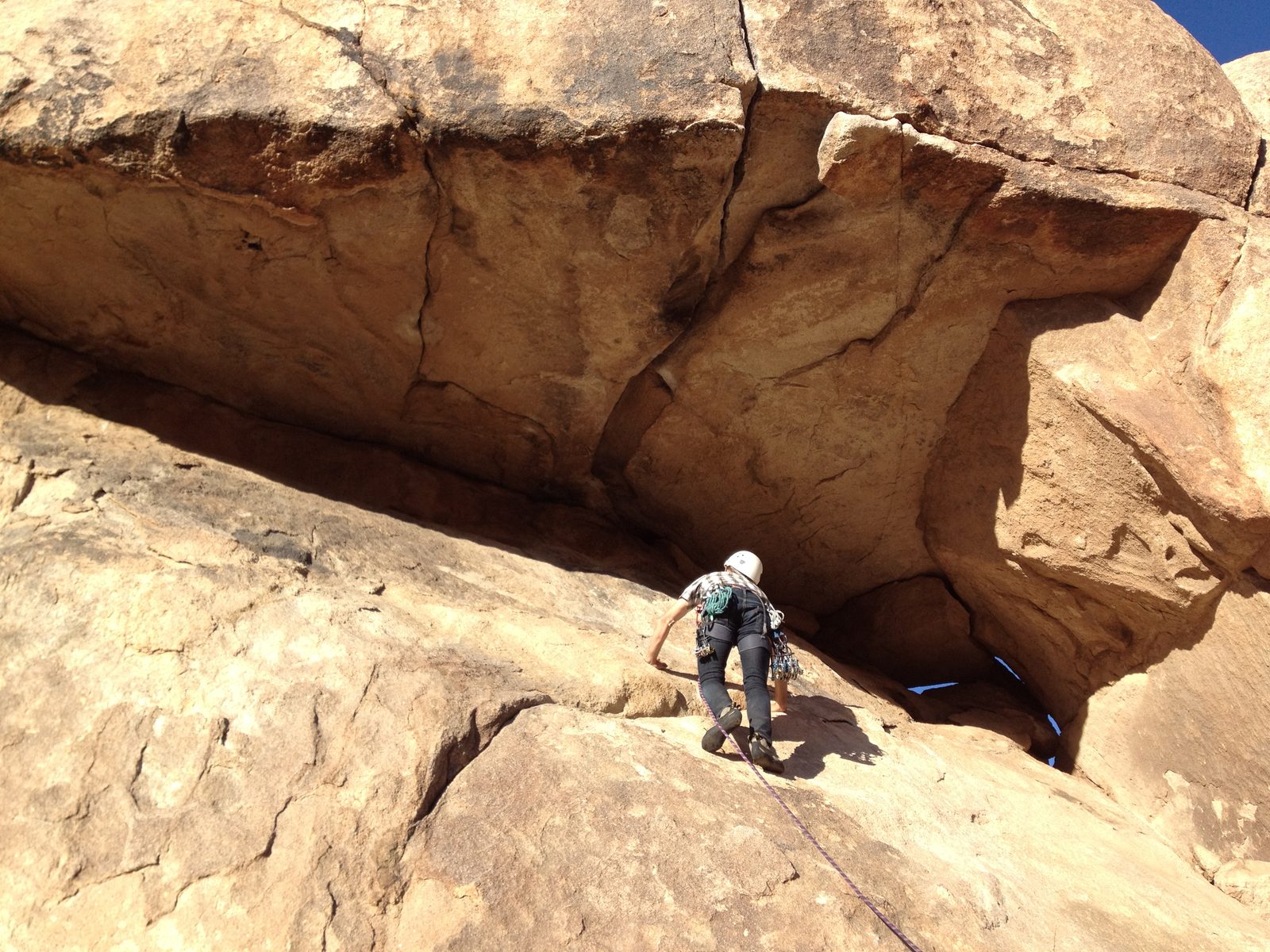 John leading the easy slab approach to the horizontal hand-crack.