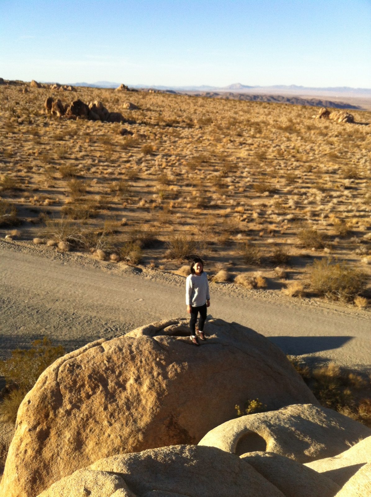 Monica scrambling on some rocks next to our campsite, upon arriving Tuesday afternoon.