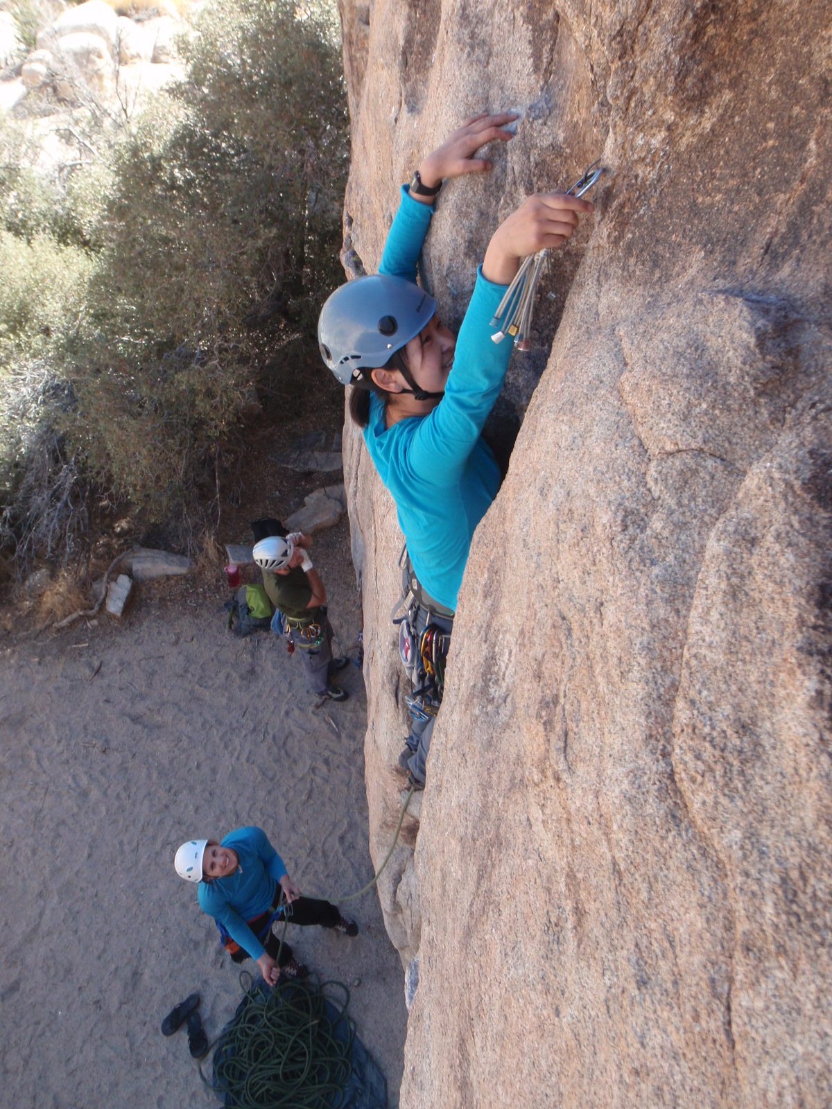 Monica working on a nut placement while Lee is belaying.