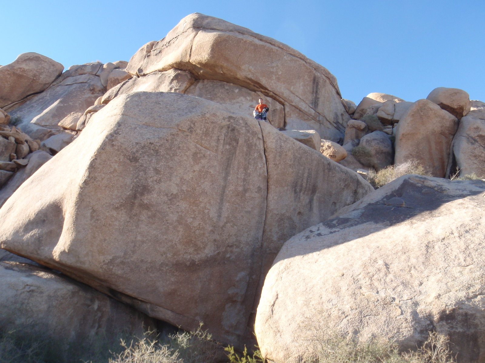 Jat atop Boortemus Boulder, site of an incredible overhanging hand crack. Also the site of my...