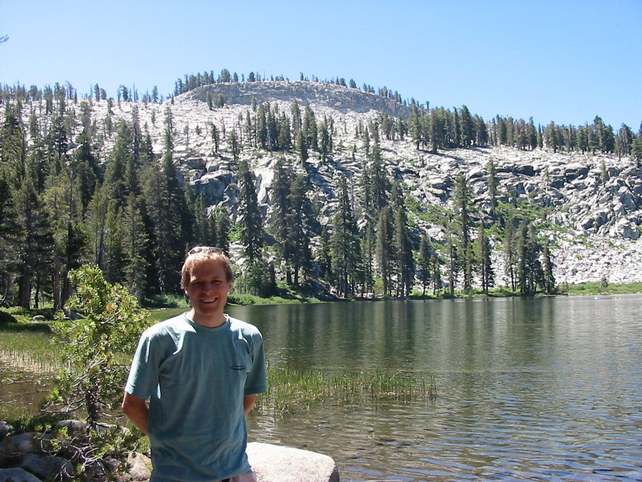 John cooling off by a sub-alpine lake.  Probably one of the Jennie Lakes.

If I remember...
