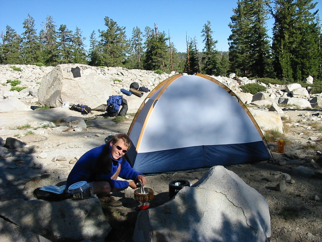 John lighting the stove.