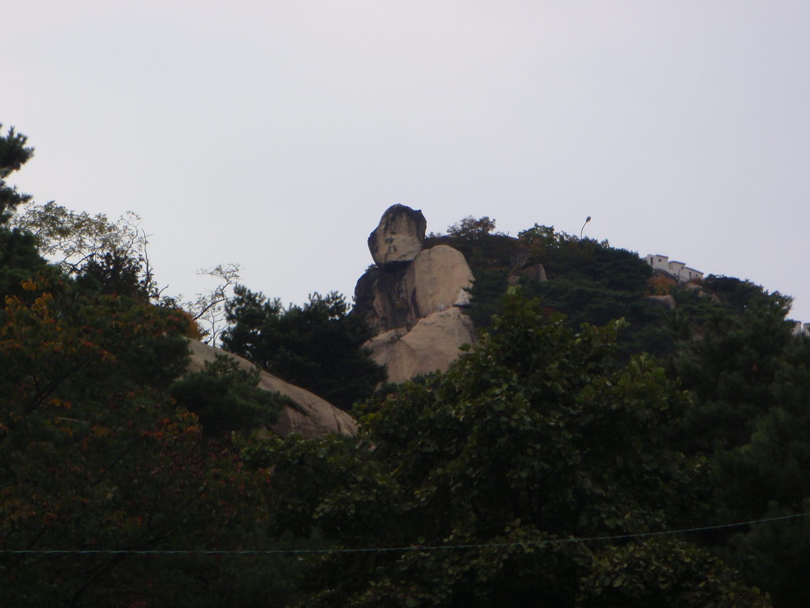 A rock that is supposed to look like a seated Buddha.  Not too hard to see, really.