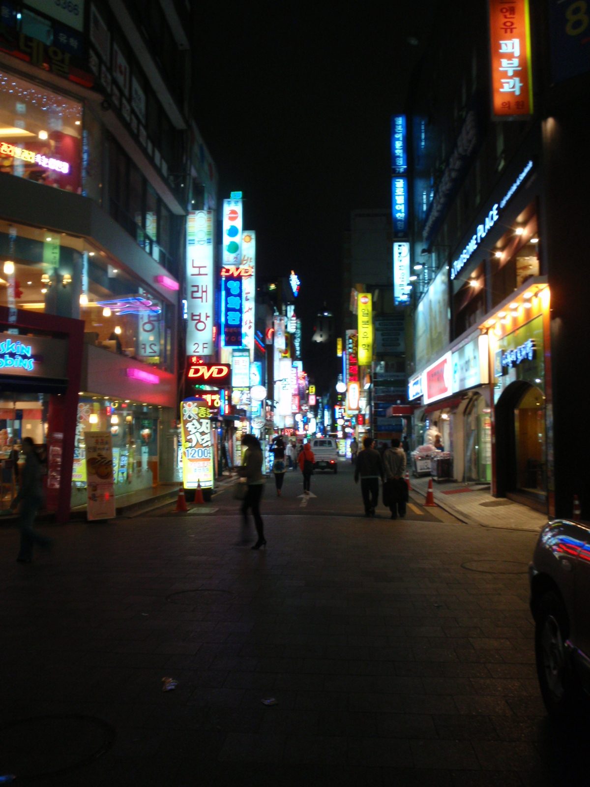 Nighttime lights in Insadong.  This neighborhood reminded me of some of the night markets in...