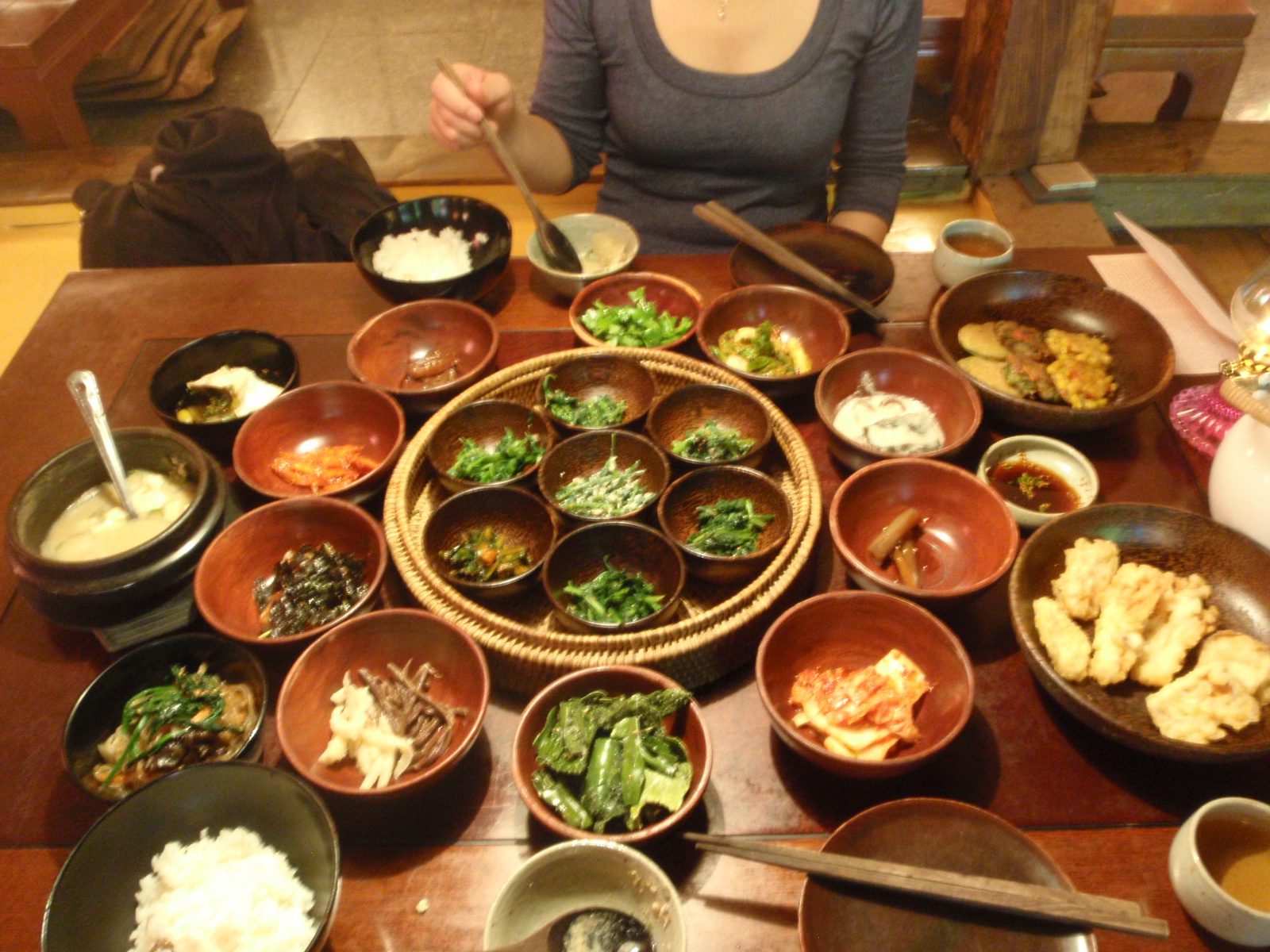 Here's our simple monk's lunch:  at least 21 distinct panchan, plus soup, rice and tea.  I...