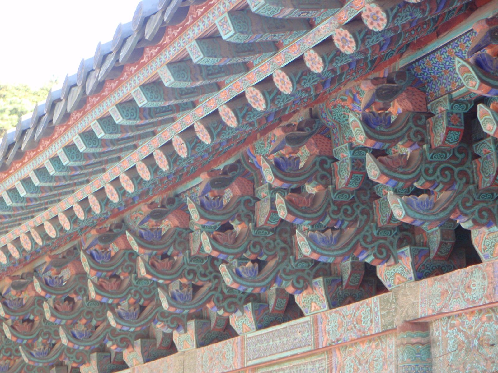 Detail of the carved and painted pine tree roofs.  Pines seemed to be the most common reliable...