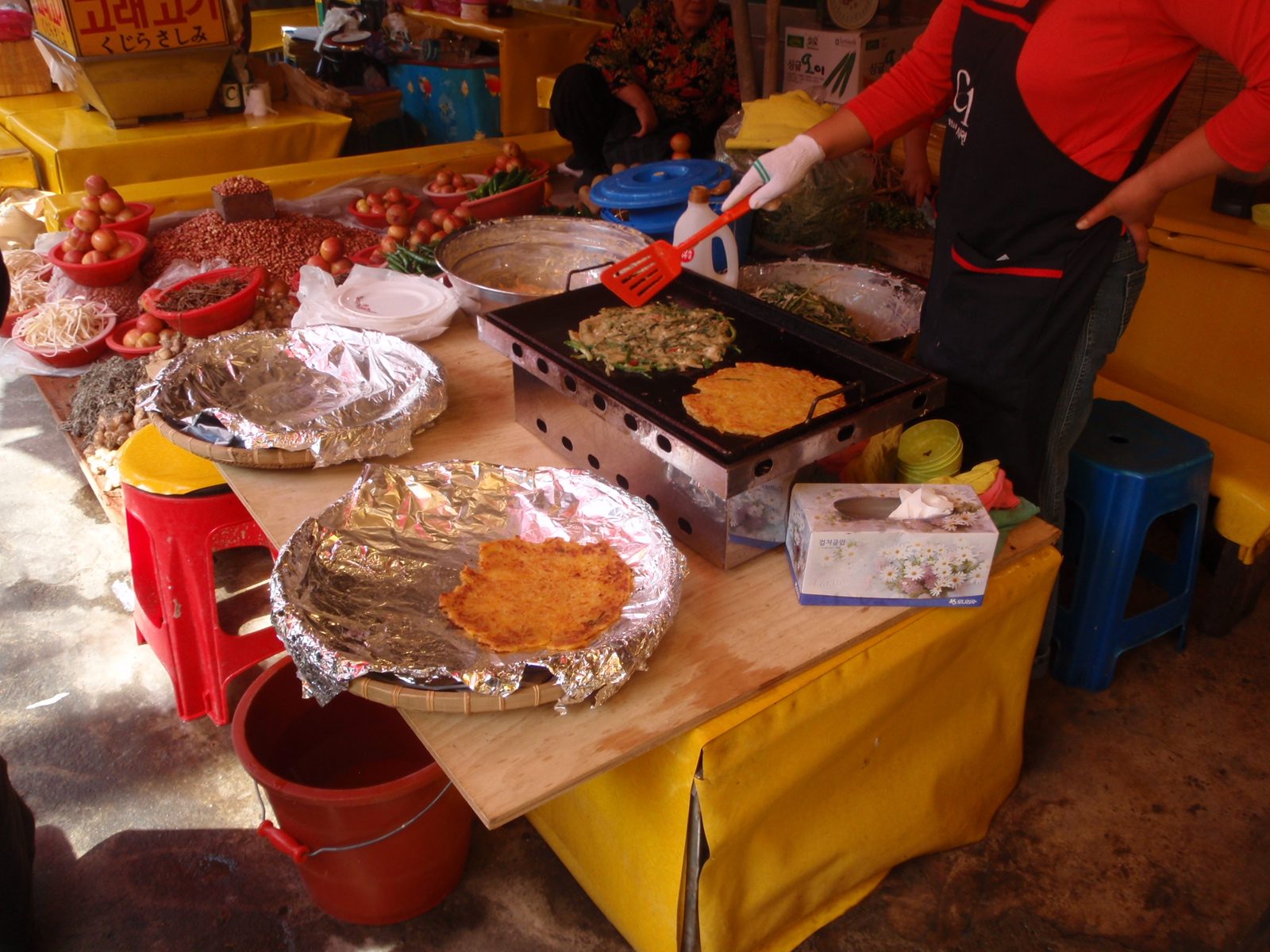 Making fish pancakes or pajeon at the Jagalchi fish market.