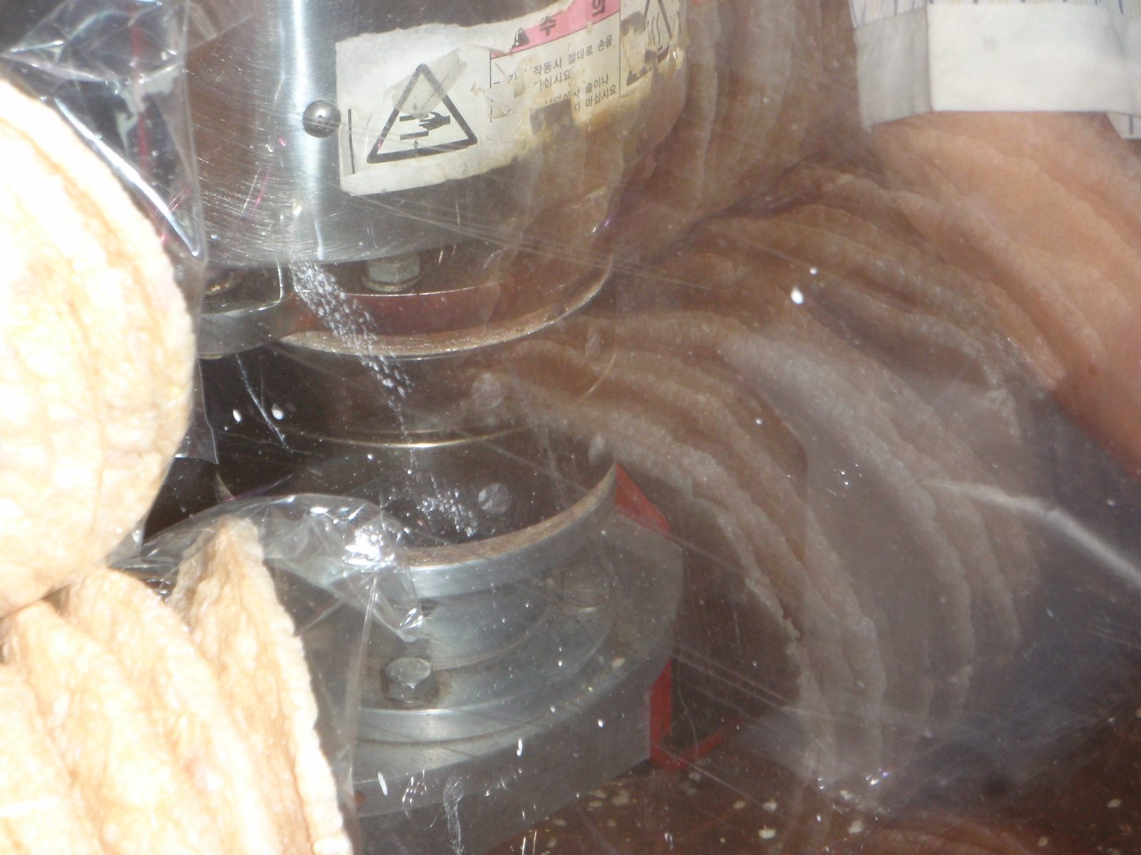 More fun automated food making machines at a truck stop: This one made puffed rice cakes.  Some...