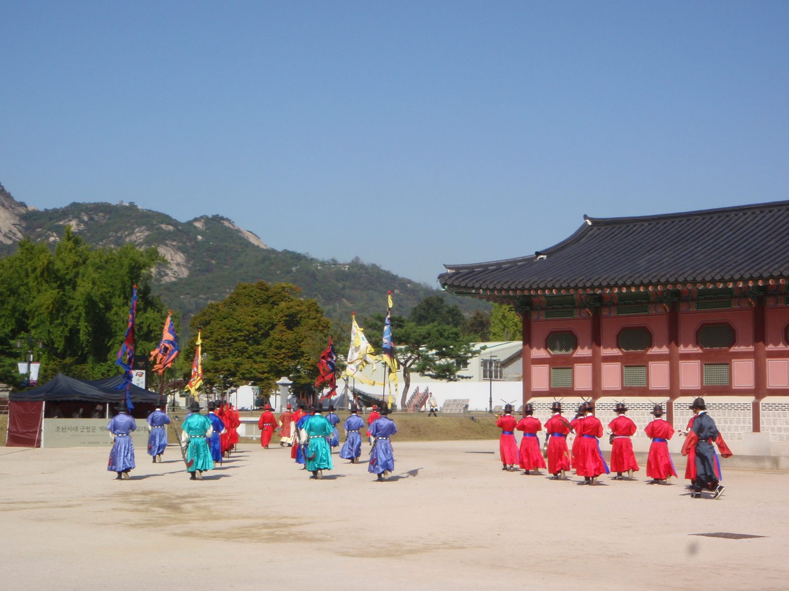 The procession leaving the front of the palace.